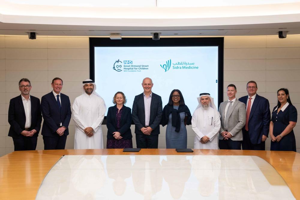 Group photo with both CEOs and other staff